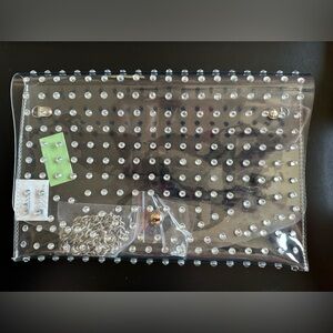 Large envelope, clear, cross, body jelly clutch with rhinestones.